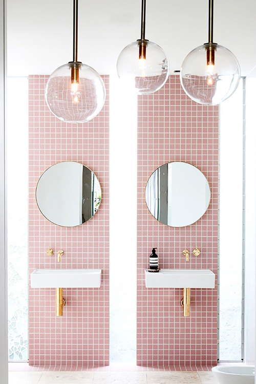 gold colourful taps in miami pink bathroom