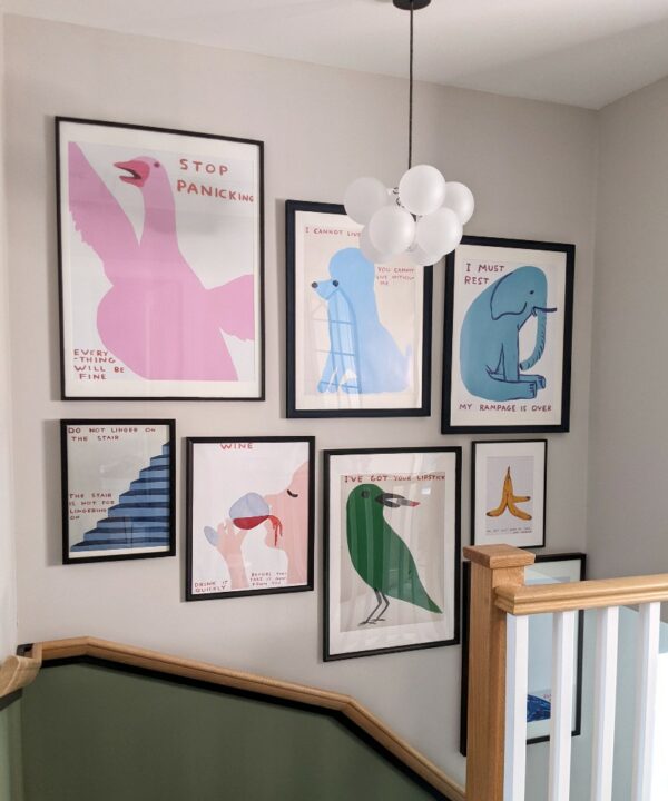 gallery wall with small bubble chandelier