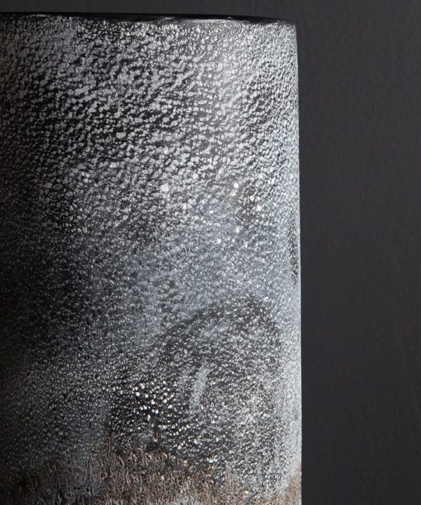 rock effect vase closeup against black background