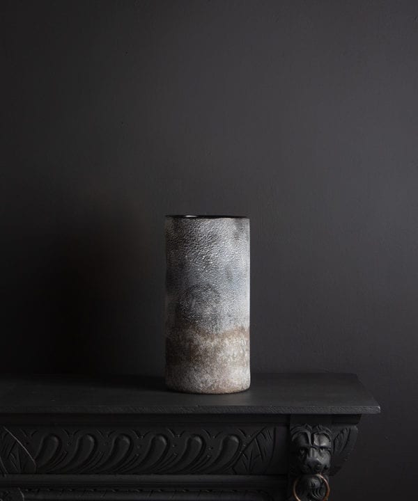 rock effect vase lifestyle shot against black background