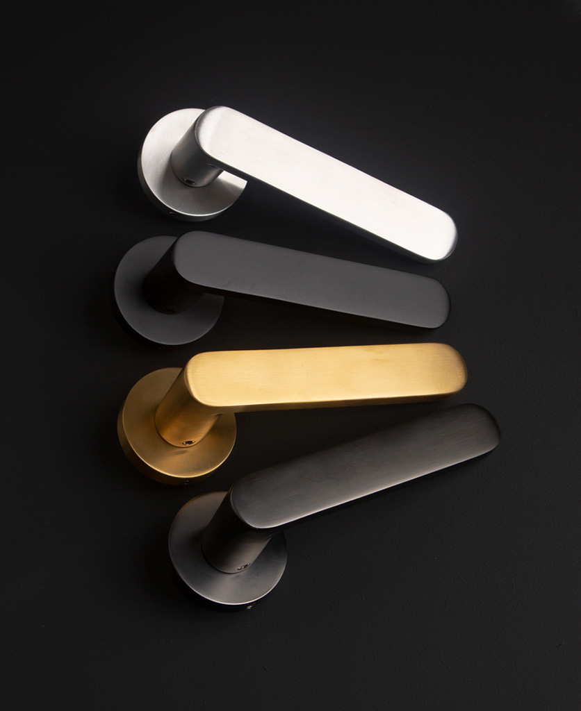 bourdelle interior door handles in gold silver black and bronze on black background