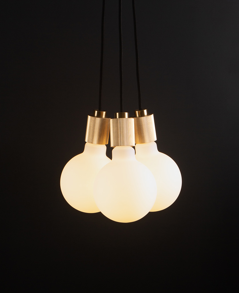 lutetia gold and black pendant lighting with three opal bulbs