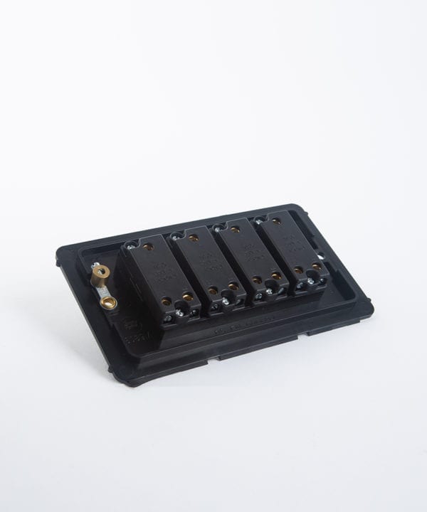 quadruple toggle switch backplate on white background