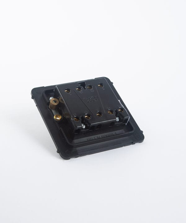 triple toggle switch backplate on white background
