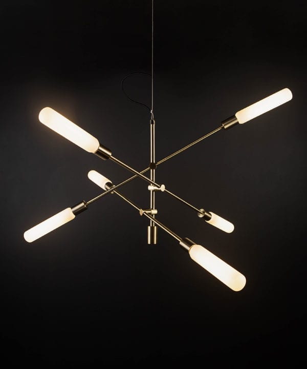 brass feature pendant lights with luna opal bulbs on black background