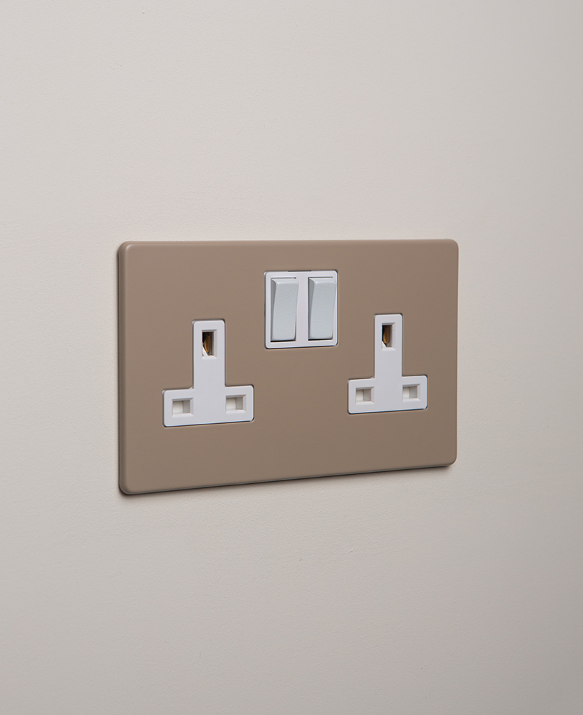 caramel latte double plug socket with white insert on white background