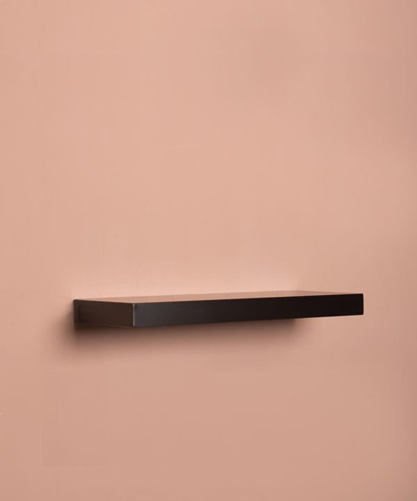 medium black floating shelf on pink background