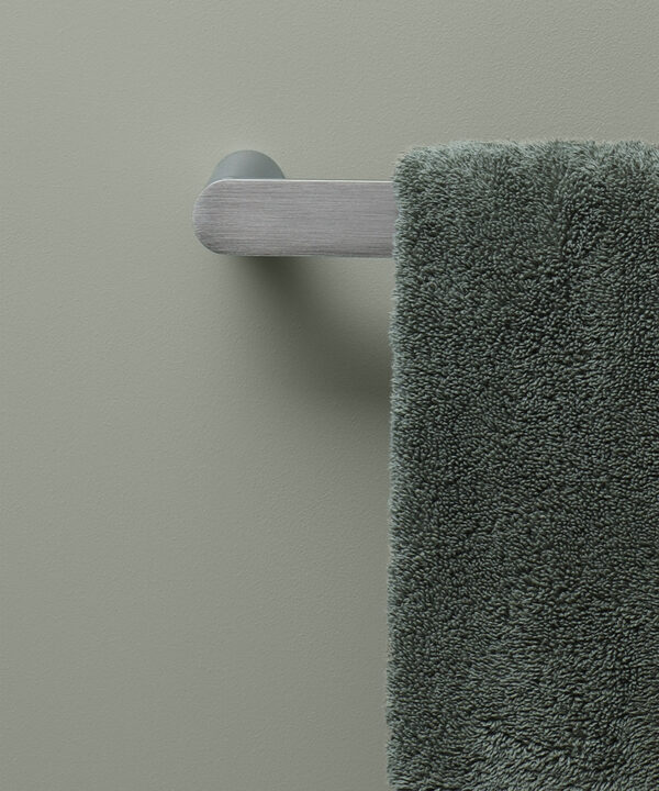 silver hand towel rail on grey background