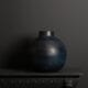 large blue grey vase on dark background