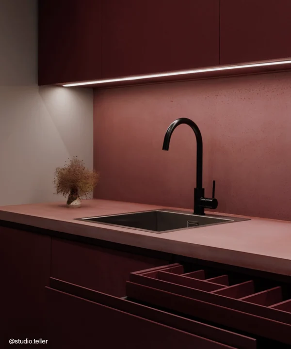 Black Tinkisso Kitchen Tap in a deep maroon kitchen.