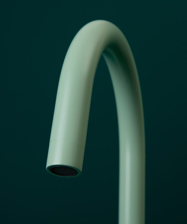 neo mint tinkisso tap close up of spout on dark green background