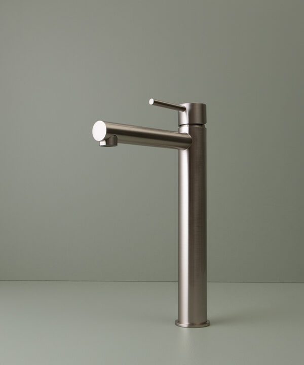 silver inga tap on green background