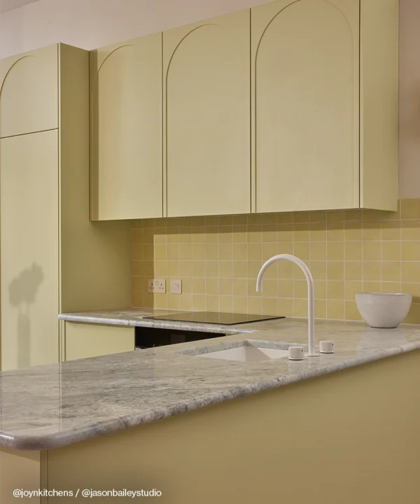 White Reeded Kitchen Tap in a butter yellow kitchen.