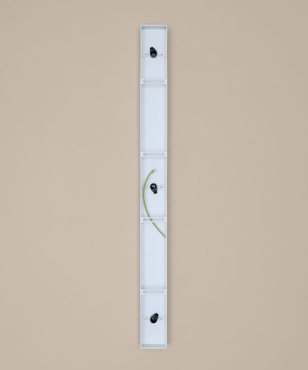 back of small white rectangular ceiling rose