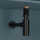 black bottle trap on blue background