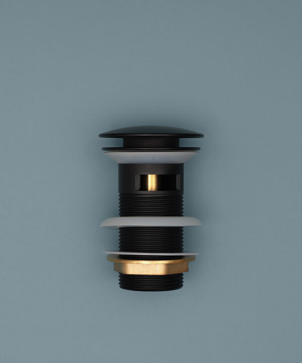 black slotted click clack waste down on blue background
