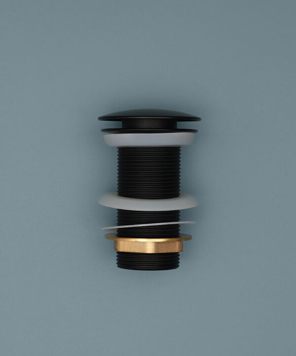 black unslotted click clack waste down on blue background