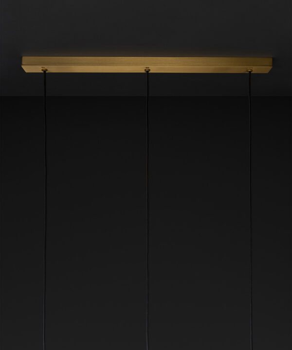 gold 3 point rectangular ceiling rose on black background