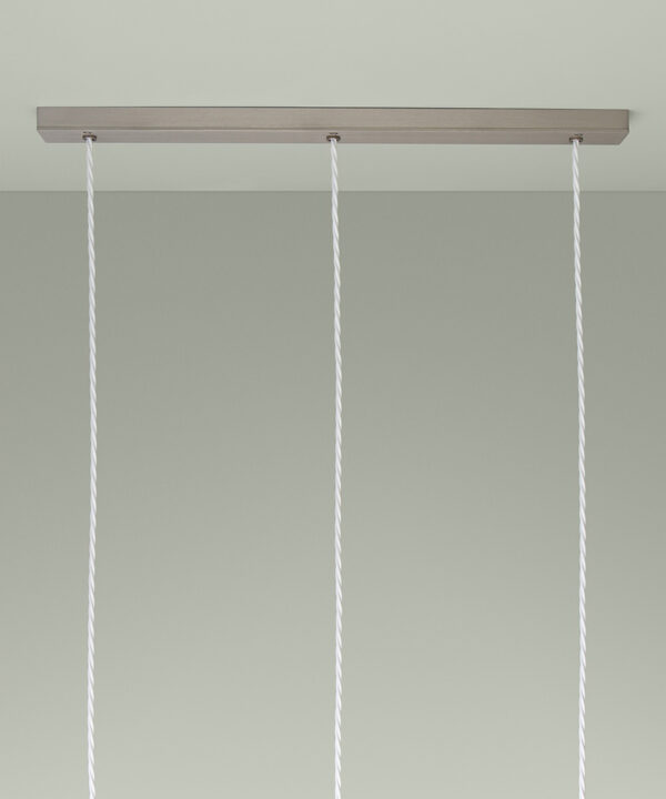 silver 3 point rectangular ceiling rose on green background