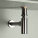 silver bottle trap on grey background