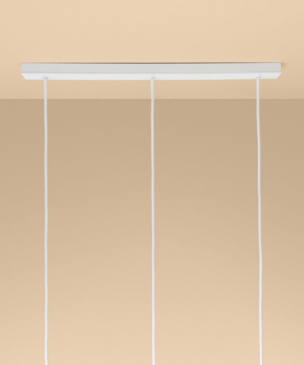 white 3 point rectangular ceiling rose with cable on peach background