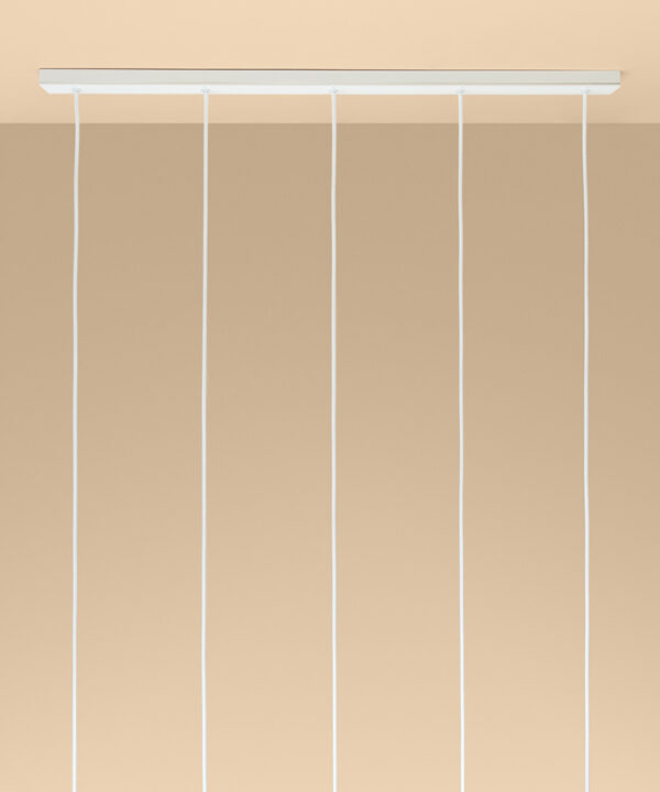 white 5 point rectangular ceiling rose with cable on peach background