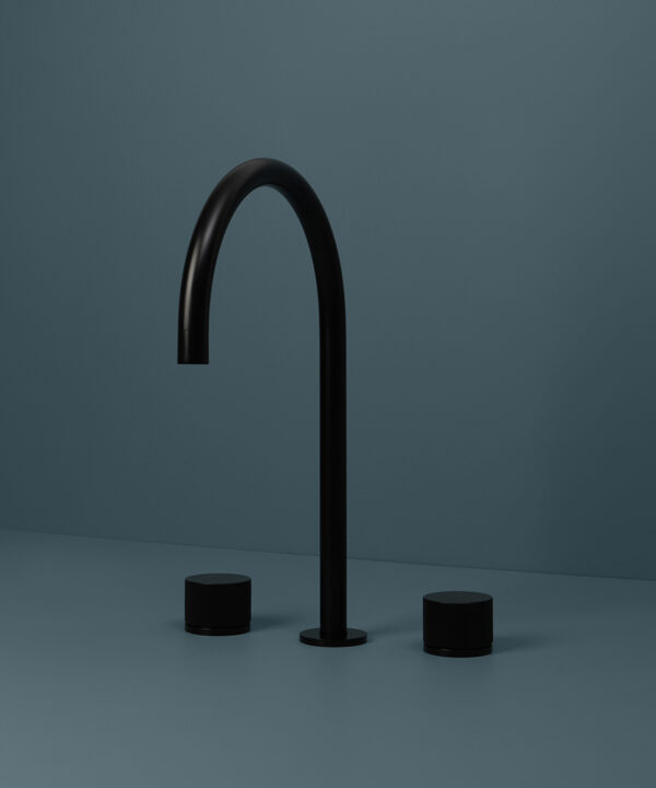 black reeded tap black reeded tap close up on blue background