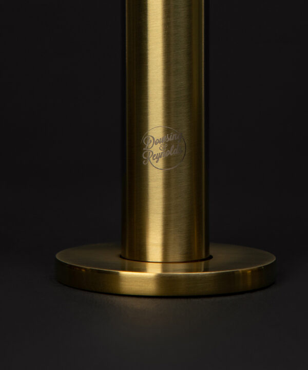 gold reeded tap close up of logogold reeded tap close up of hot handle on black background