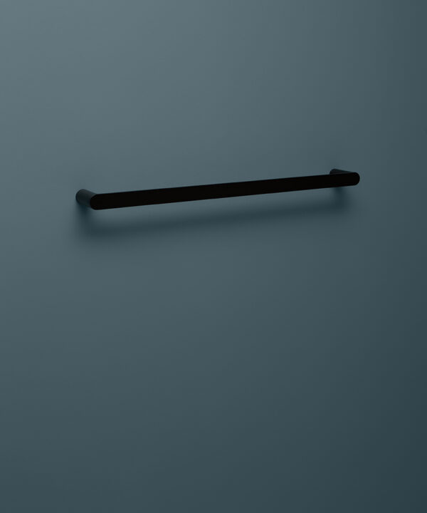 black towel rail on blue background