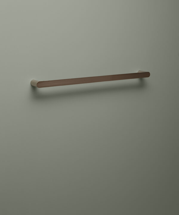 silver towel rail on grey background