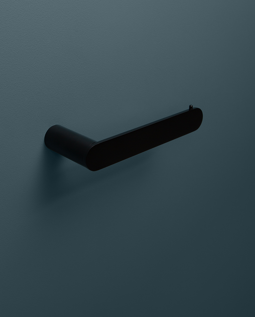 black paper holder on blue background