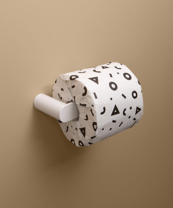 white paper holder on peach background