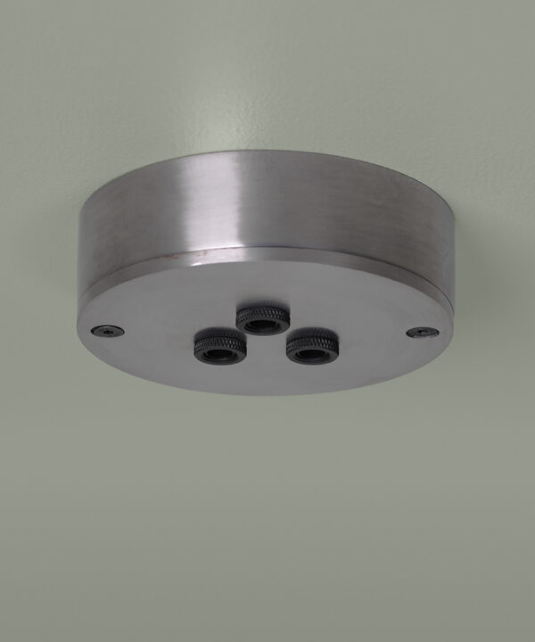 raw steel three point ceiling rose against soft grey background