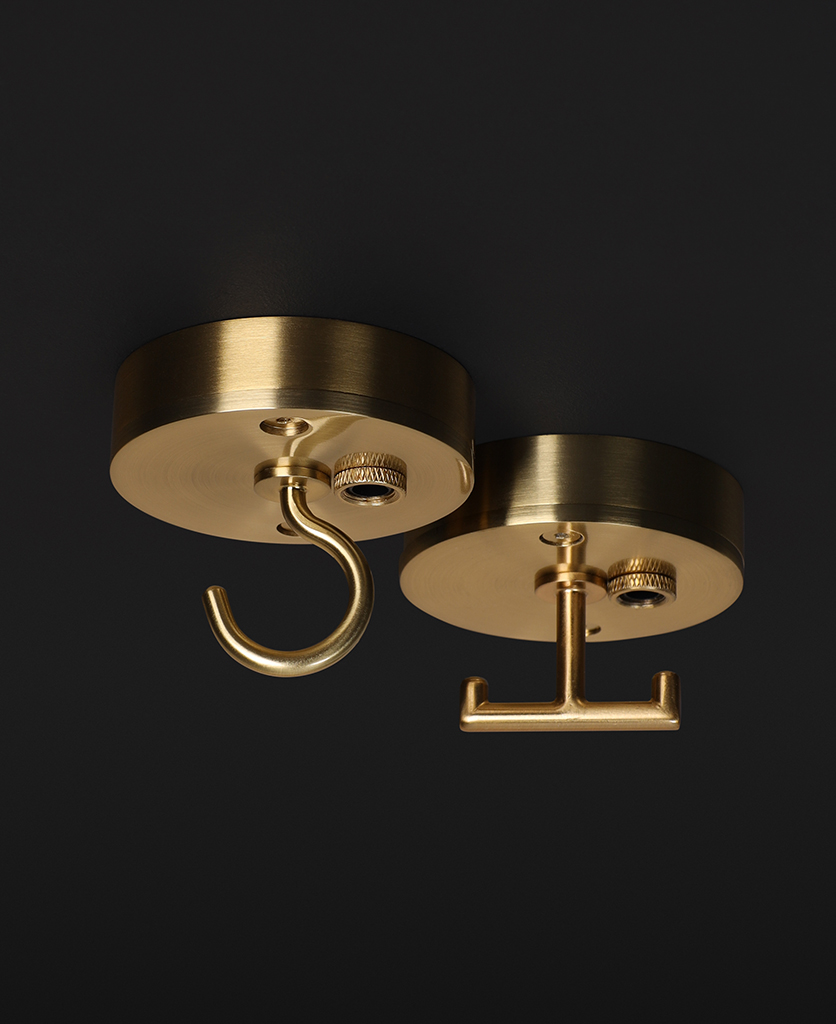 smoked gold c-hook and t-hook ceiling roses on black background