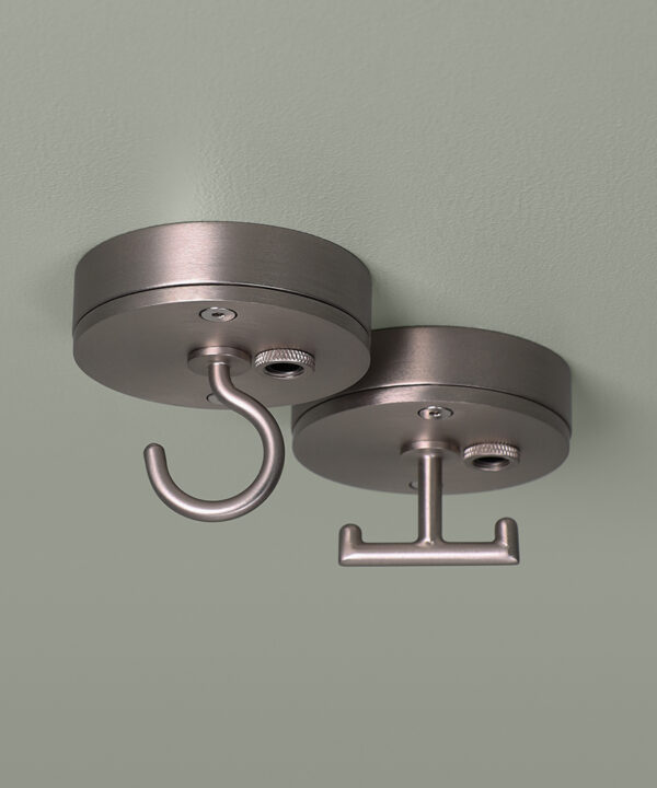 small silver c-hook and t-hook ceiling roses on grey background