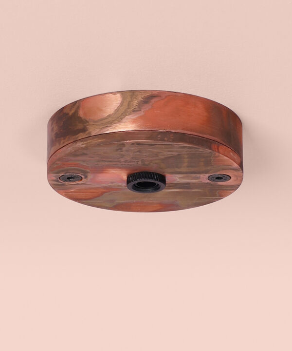 tarnished copper small 1 point ceiling rose on pink background