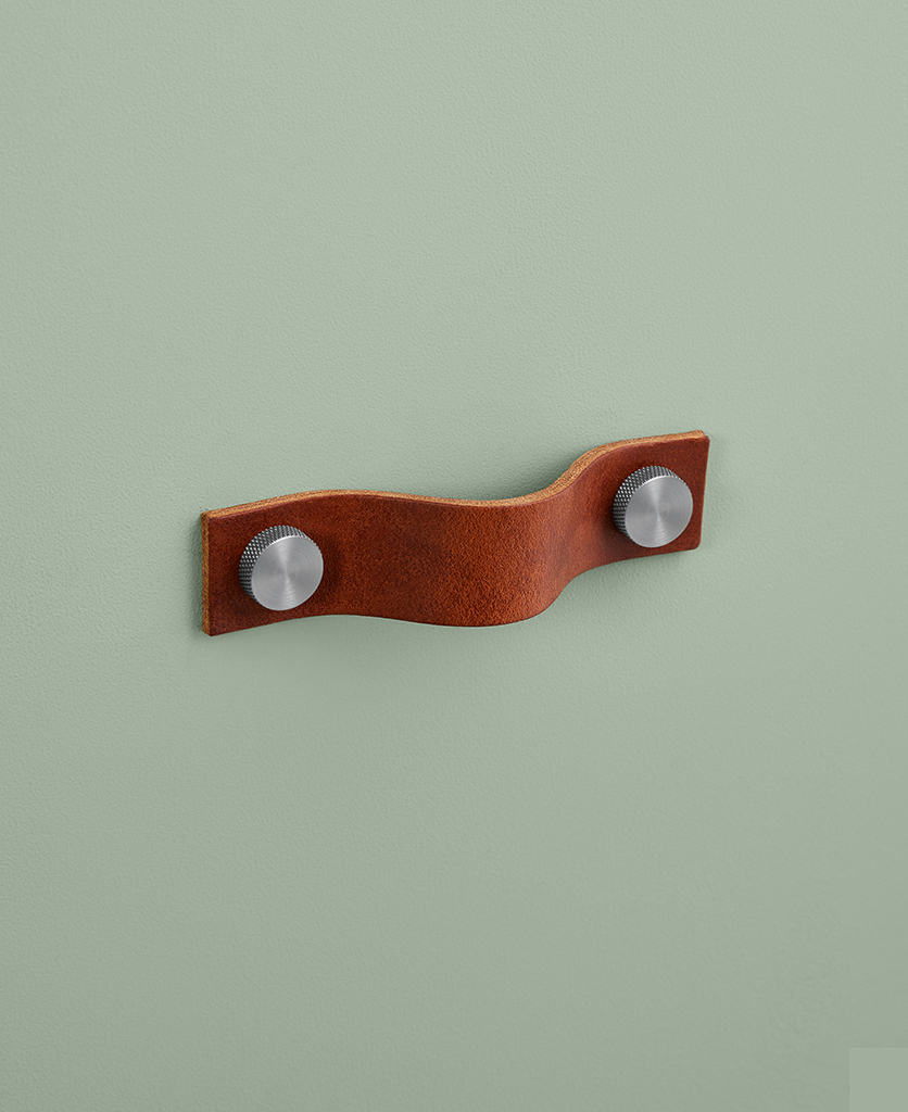 small dark tan magni with brushed nickel knob