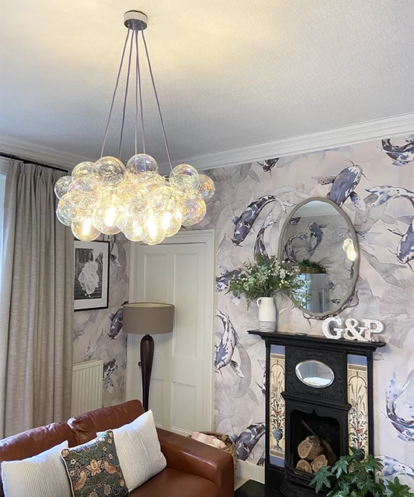 Large Iridescent bubble chandelier on a white ceiling.
