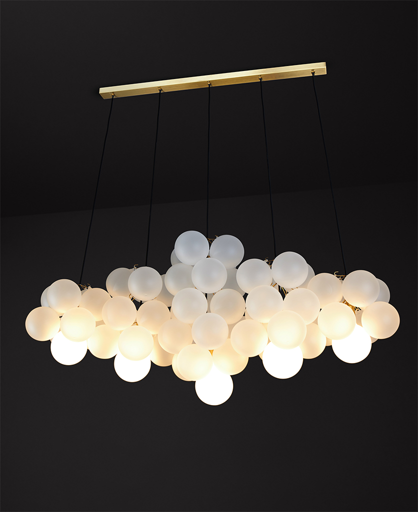 large gold ceiling light with cloud of frosted glass bubbles