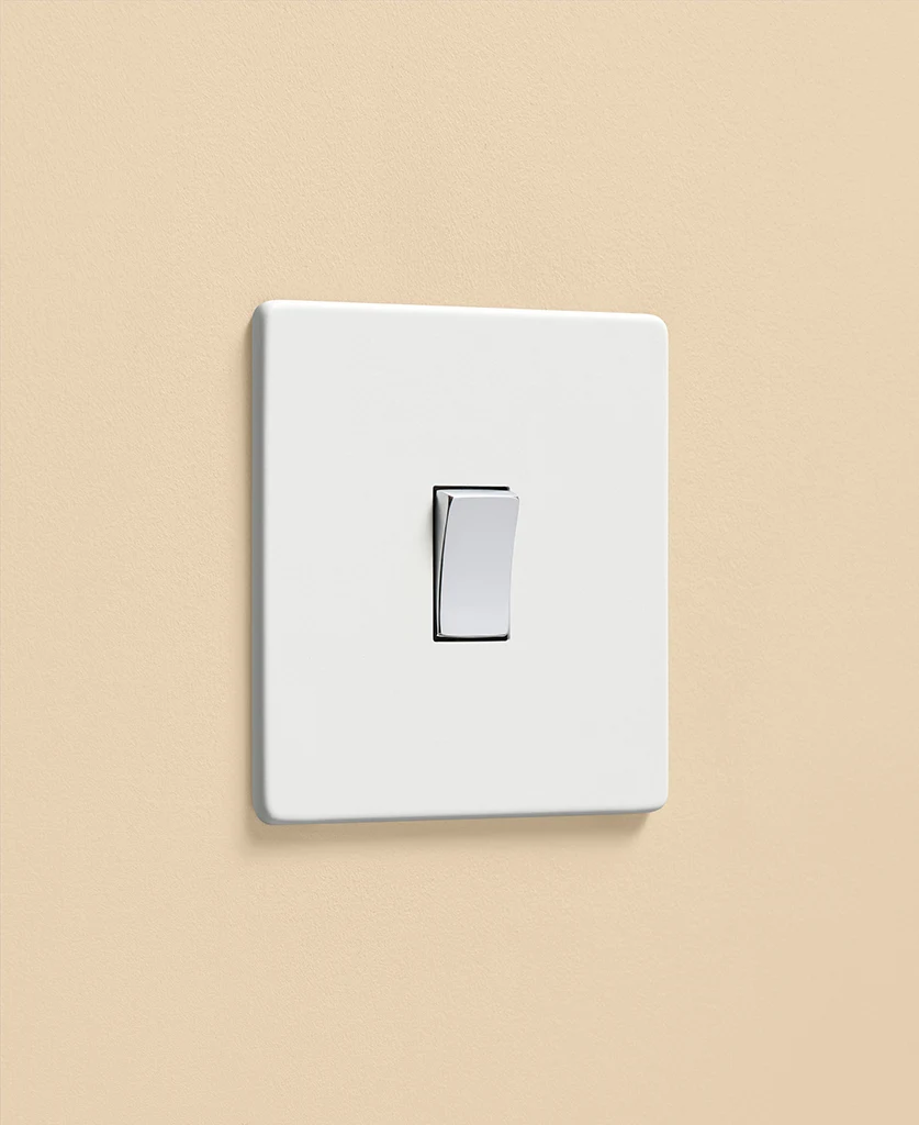 white rocker switch with metal plate and chrome switch
