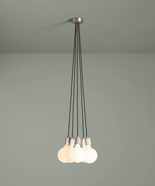 Full product shot of silver meurice dining table light against black background