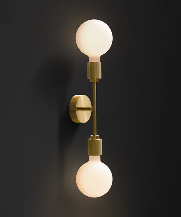 gold Belgravia art deco inspired wall light with two opaque globe bulbs on a black background