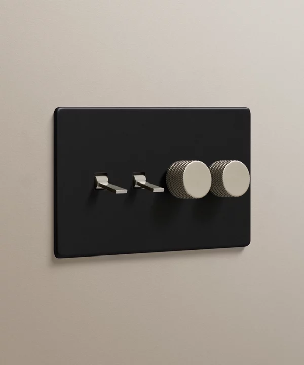 matt black combination light switch with two silver tapered toggles and two silver knurled dimmer knobs