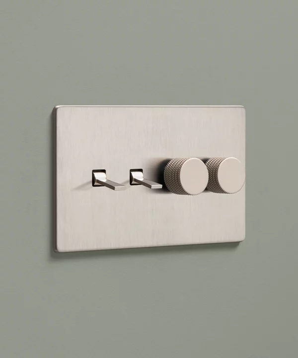 brushed silver combination switch with two tapered toggles and two knurled dimmer knobs