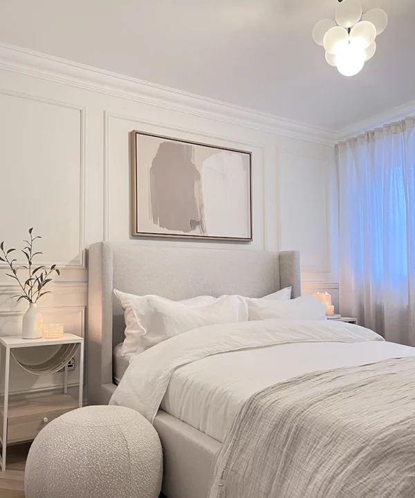 Black frosted low rise bubble chandelier in neutral bedroom.