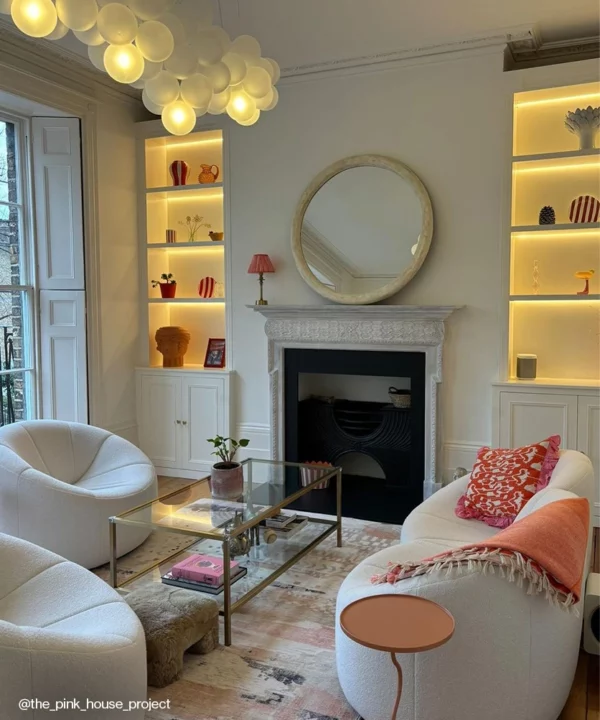 Cloud bubble chandelier in a neutral living room.