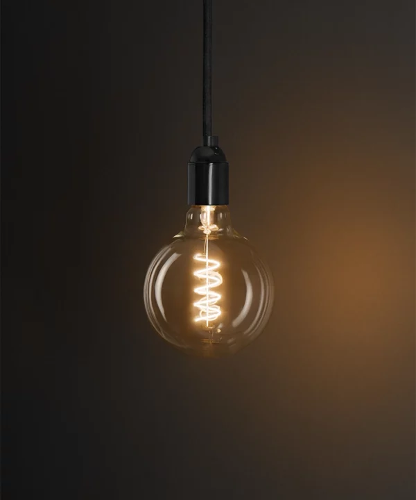 Globe spiral filament warm glow LED bulb