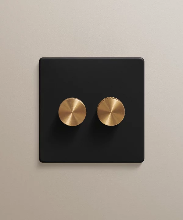 Black double dimmer 2 gang with gold knurled knobs