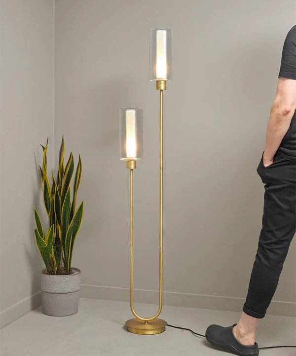gold floor lamp in a neutral room