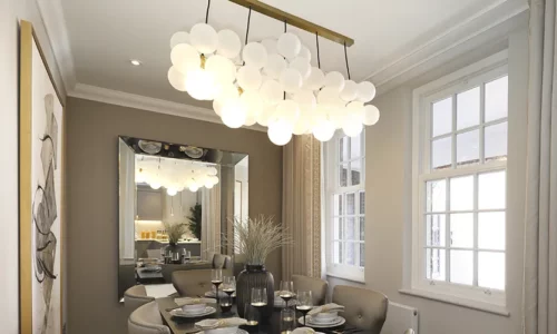 dining room with cloud bubble chandelier hanging over the dinign table